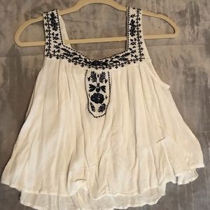 size medium; blue and white cropped tank top